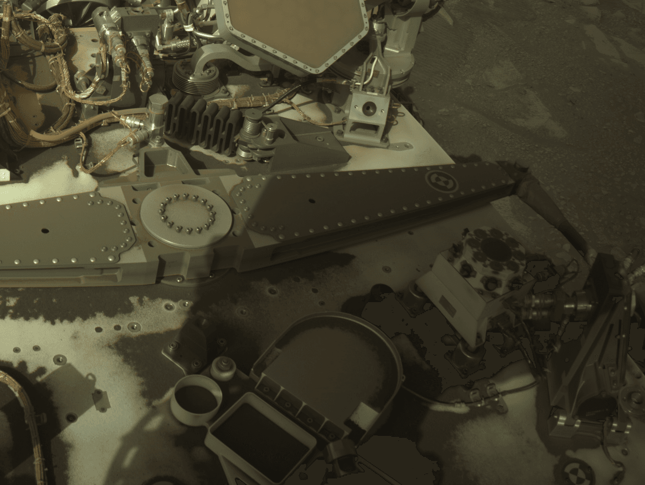 Close-up color view of Perseverance's own deck and engineering hardware, captured by one of its navigation cameras.